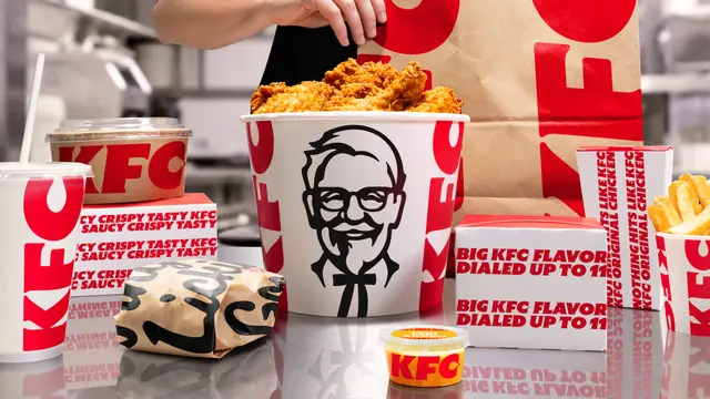 KFC branded meal spread with bold red-and-white packaging