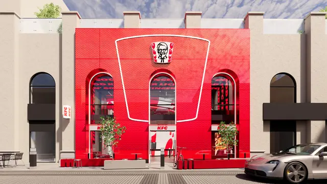 KFC concept store exterior (2026) — red perforated façade with bucket outline