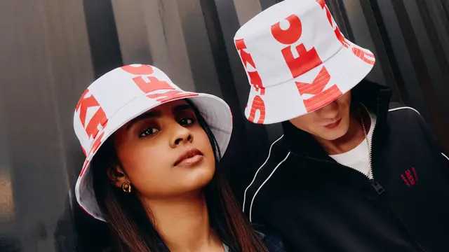 KFC-branded white bucket hats — streetwear product photo