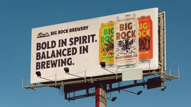 Big Rock Brewery billboard with three illustrated beer cans