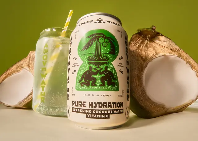 Above Water — Pure Hydration sparkling coconut water can with halved coconuts
