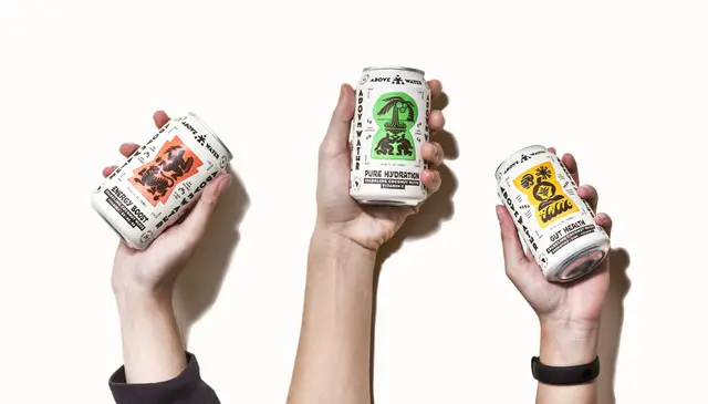 Above Water beverage cans — trio of illustrated labels (center: PURE HYDRATION)