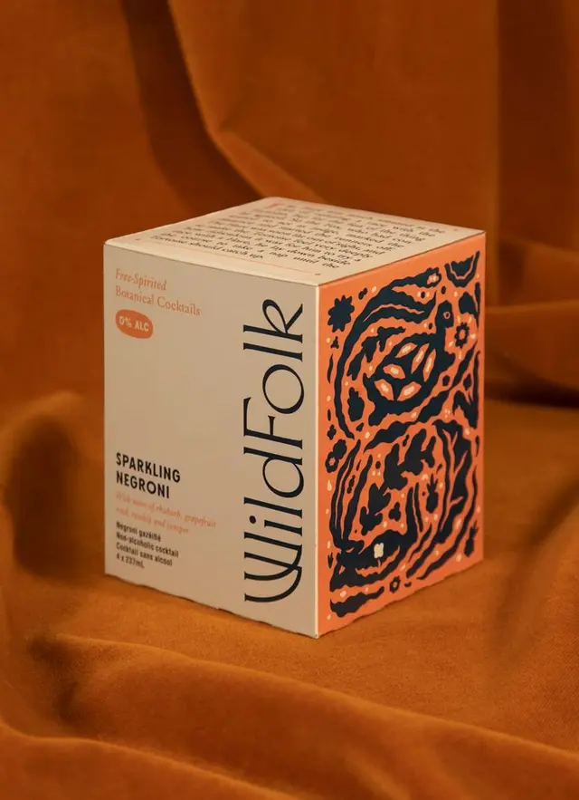 Wild Folk — folklore‑inspired non‑alcoholic Vermouth Spritz packaging still life