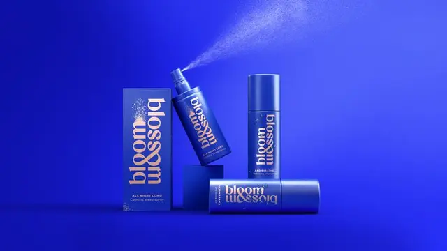 Bloom and Blossom — JKR packaging refresh: pastel flat‑lay with bold blue logotype