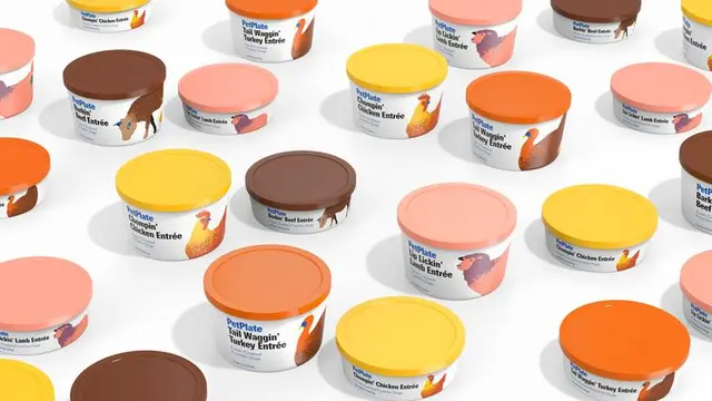 PetPlate packaging — cobalt-blue boxes with illustrated dogs (DIELINE)