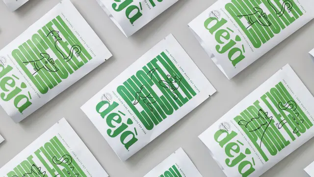 déjà — zero‑waste dog food packaging, white paper pouches with bold green typography (DIEL
