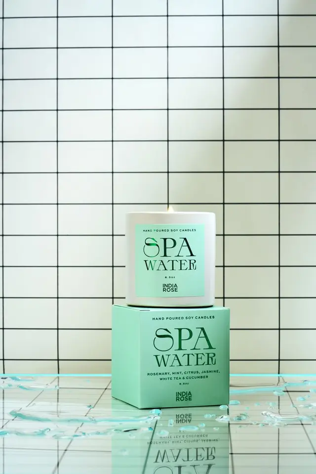 India Rose 'Spa Water' candle packaging — mint-green pastel product shot