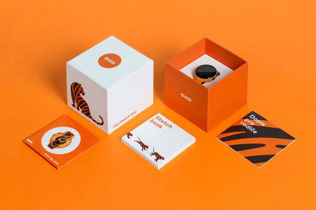Aiko kids smartwatch — bright orange cube packaging