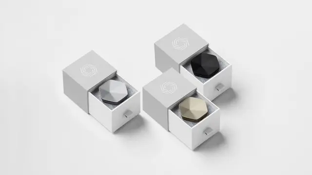 Plume WiFi pods — faceted mesh routers in black, light gray and champagne gold