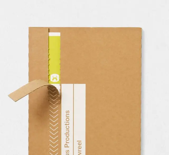 Nexus Productions showreel boxed set — kraft cardboard cases with yellow elastic straps