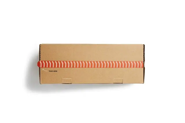 Kengos kraft sneaker box with screen-printed sneaker and polka-dot tissue
