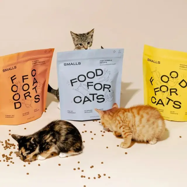Smalls 'Food for Cats' pouches with three kittens and scattered kibble