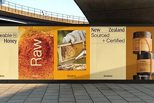 Manukora identity and packaging — serif wordmark on golden-yellow