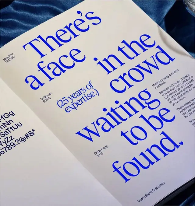 Brand-guidelines spread with oversized cobalt-blue serif headline