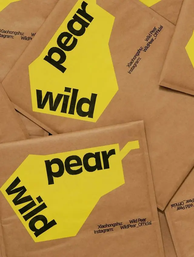 Wild Pear kraft-mailer with yellow die-cut pear label