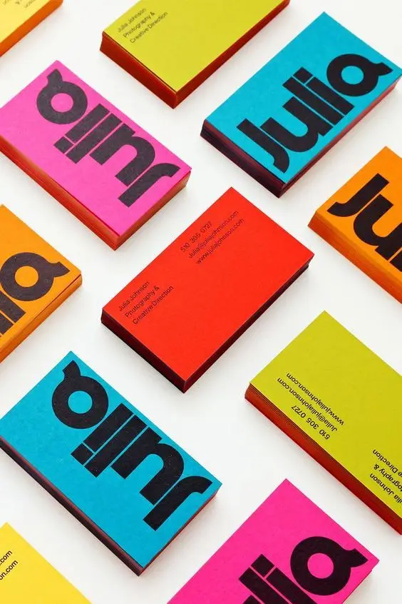 Neon business card set with oversized 'Julia' logotype