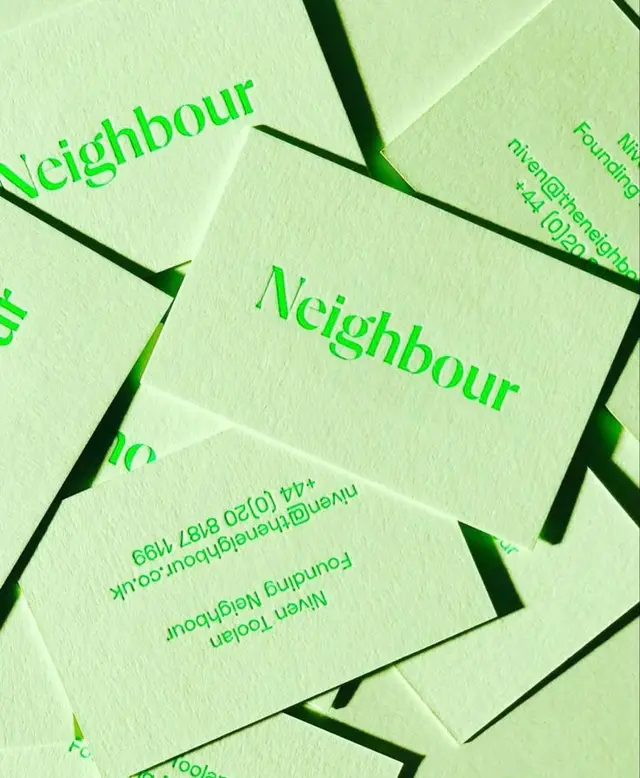 Neighbour square letterpress business cards — mint cardstock with neon-green type