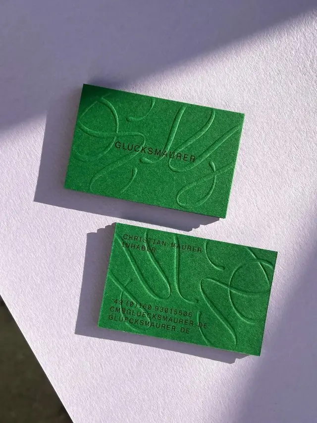 Embossed emerald business cards — GLÜCKSMAURER