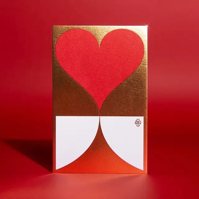 Gold-foil Valentine card with red heart and white semicircles