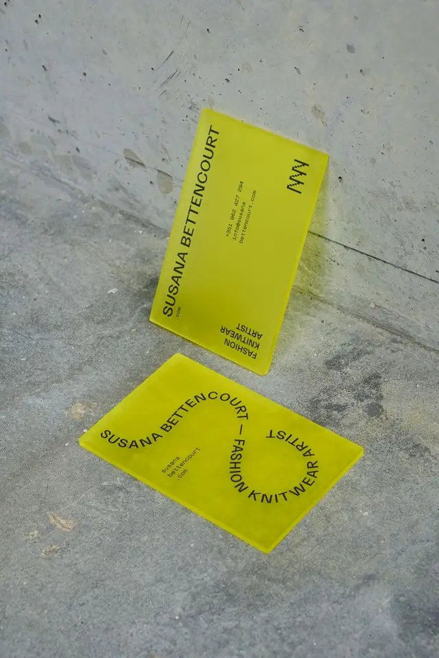Neon-yellow translucent acrylic business cards for Susana Bettencourt