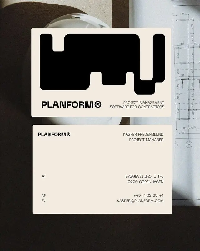 PLANFORM® business card — minimalist black logo on cream stationery