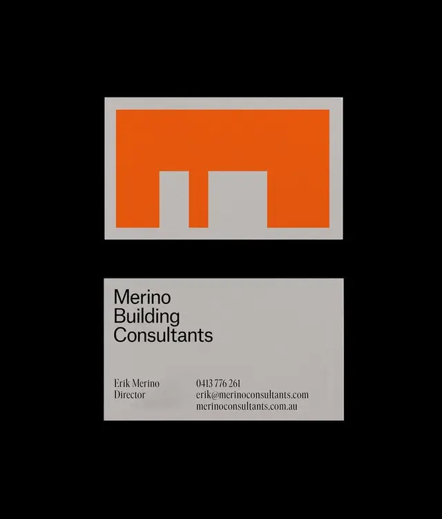 Merino Building Consultants business card with orange geometric logo
