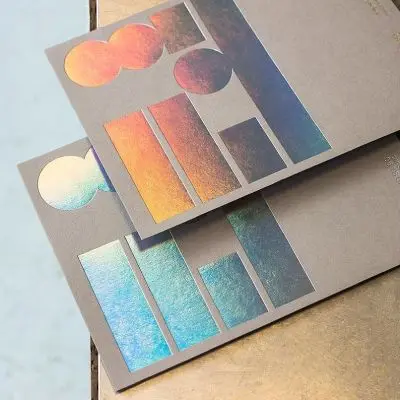 Matte grey business cards with holographic geometric foil
