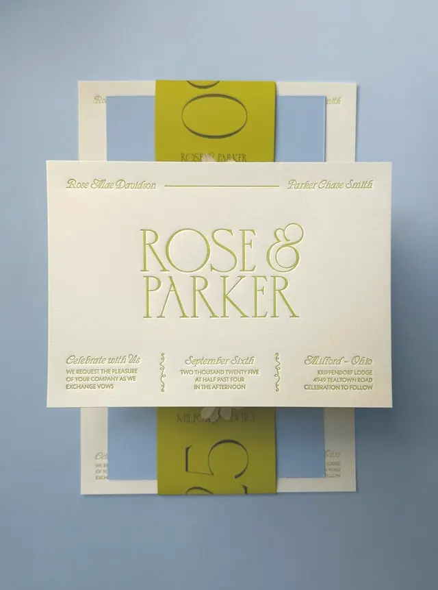 Rose & Parker letterpress wedding invitation suite with olive belly band
