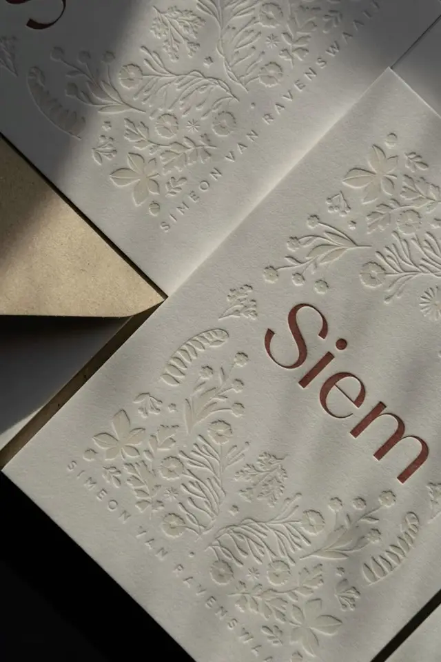 Cream letterpress invitation with blind floral embossing — 'Siem'