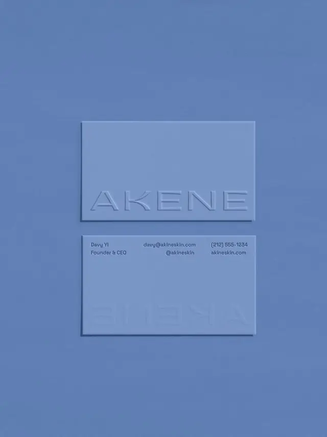AKENE monochrome blue debossed business-card mockup