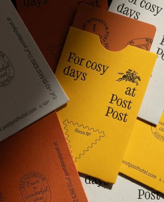 Post Post mustard-yellow room sleeve — 'For cosy days' hotel stationery
