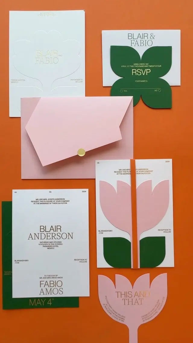 Blush pink & green tulip wedding invitation suite — flatlay