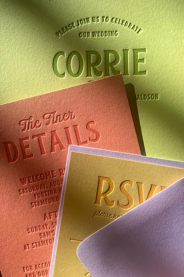 Letterpress wedding suite with embossed 'CORRIE' and pastel RSVP