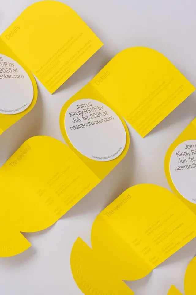 Bright yellow die-cut RSVP and wedding invitation stationery