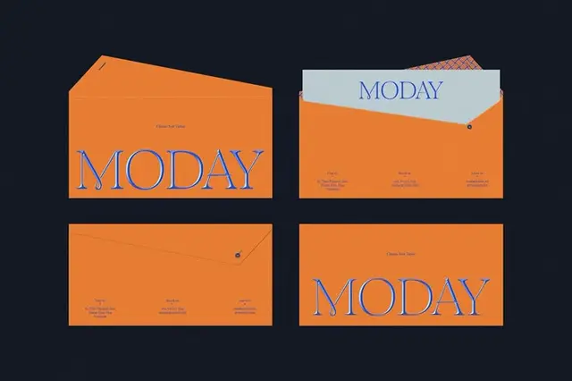 Orange envelope stationery set with large blue 'MODAY' logotype