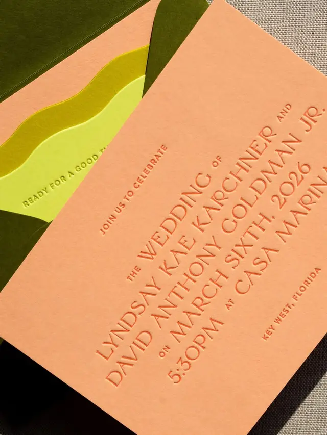 Peach letterpress wedding invitation with olive envelope and neon yellow scalloped liner