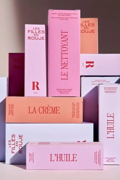 Rouje Les Filles en Rouje pastel skincare packaging — Le Nettoyant, La Crème, L'Huile