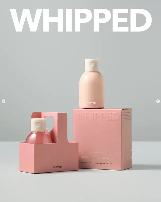 Blush-pink 'WHIPPED' product packaging set — minimalist studio shot