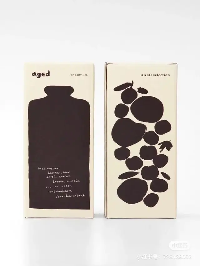 Minimalist cream product boxes with black silhouette vase and clustered fruit motifs