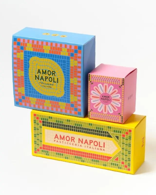 Amor Napoli mosaic pastry gift boxes — blue, pink, yellow packaging
