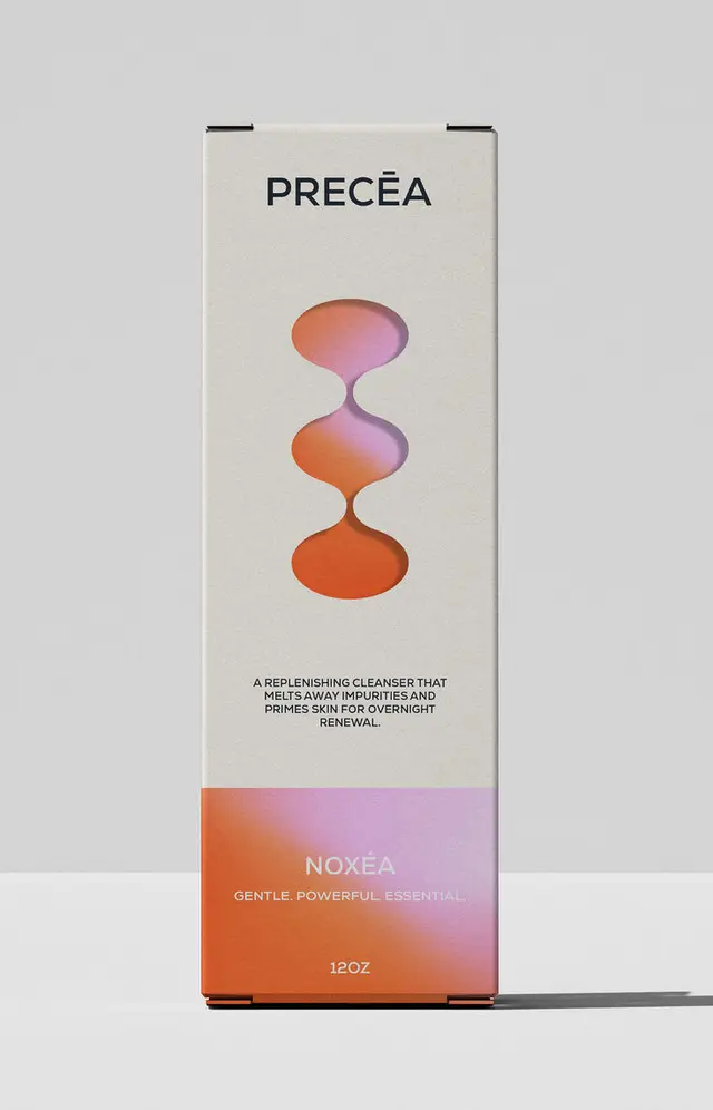 PRECĒA NOXÉA skincare box — minimal die-cut packaging with orange-pink gradient