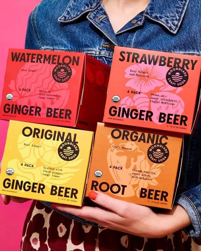Moonglade craft soda 4‑pack boxes — Watermelon, Strawberry, Original Ginger, Organic Root