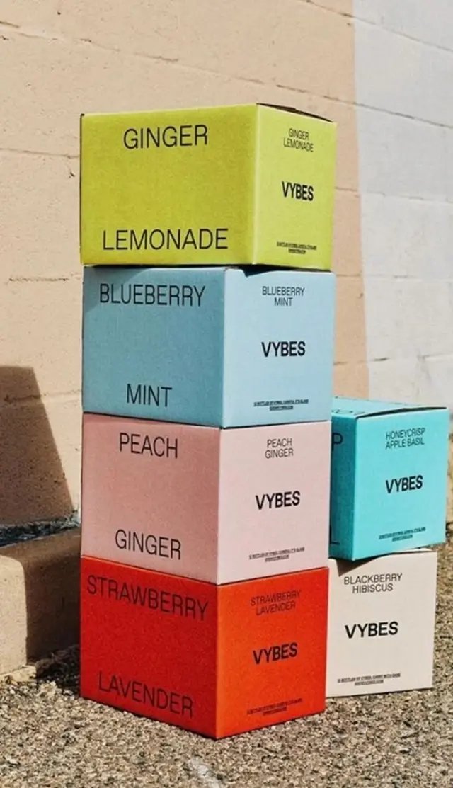 VYBES flavor boxes — stacked pastel beverage packaging