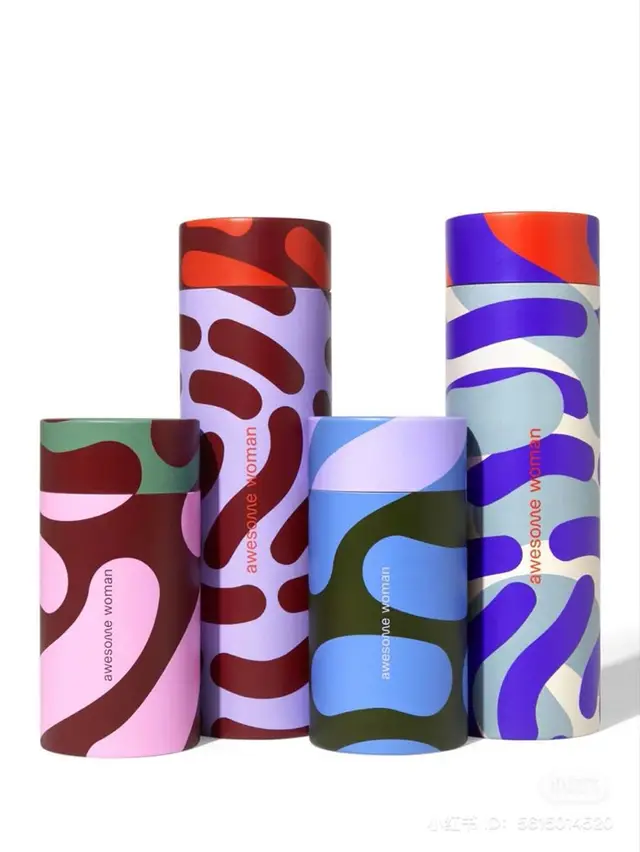 Colorful abstract-pattern cylindrical packaging set with 'awesome woman' text