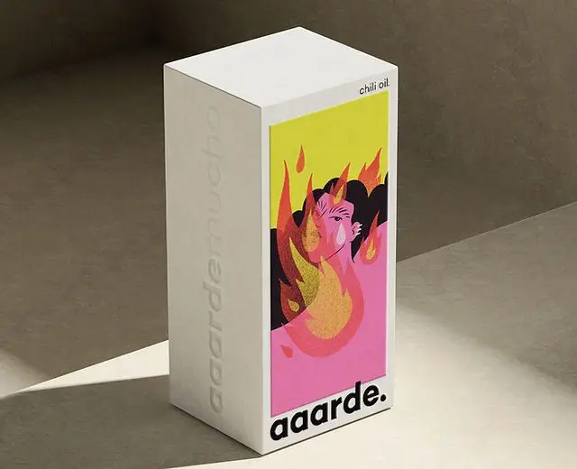 aarde. chili oil — white rectangular product box with flame illustration