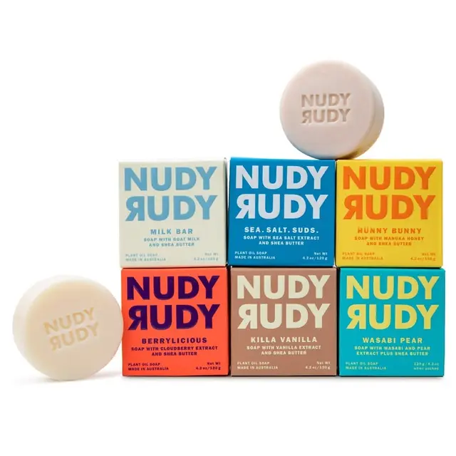 Nudy Rudy colorful soap packaging stack — Milk Bar, Sea. Salt. Suds., Hunny Bunny, Berr.y-