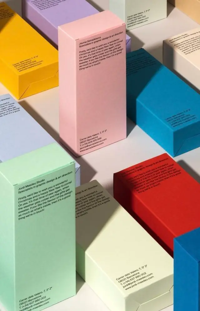 Pastel and primary color product packaging with minimal black typography