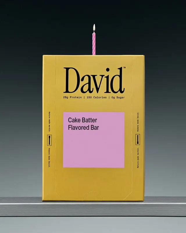 David Cake Batter Flavored Protein Bar — yellow box with pink candle