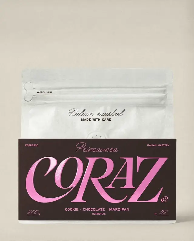 Primavera CORAZ espresso — white resealable pouch with dark sleeve and metallic pink logo