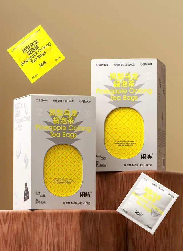 Pineapple Oolong Tea Bags — yellow pineapple-window retail packaging